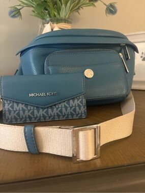 Michael Kors Blue Zipper fanny pack with the extra wallet